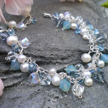 Blue Skies Ahead - Charm Bracelet / Sterling Silver, Freshwater Pearls & Swarovski Crystal Blue Skies Ahead - Charm Bracelet / Sterling Silver, Freshwater Pearls & Swarovski Crystal